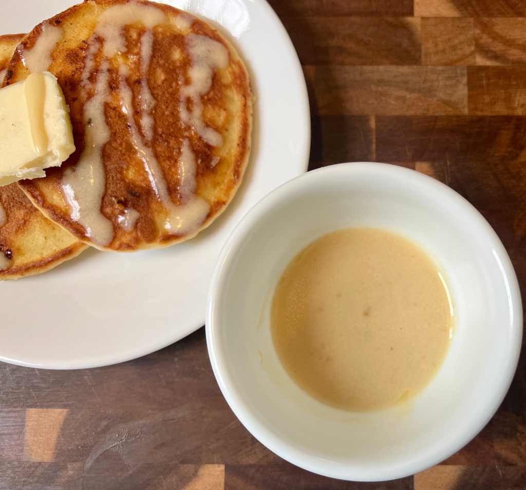Keto almond flour pancakes served with homemade sugar-free syrup and butter