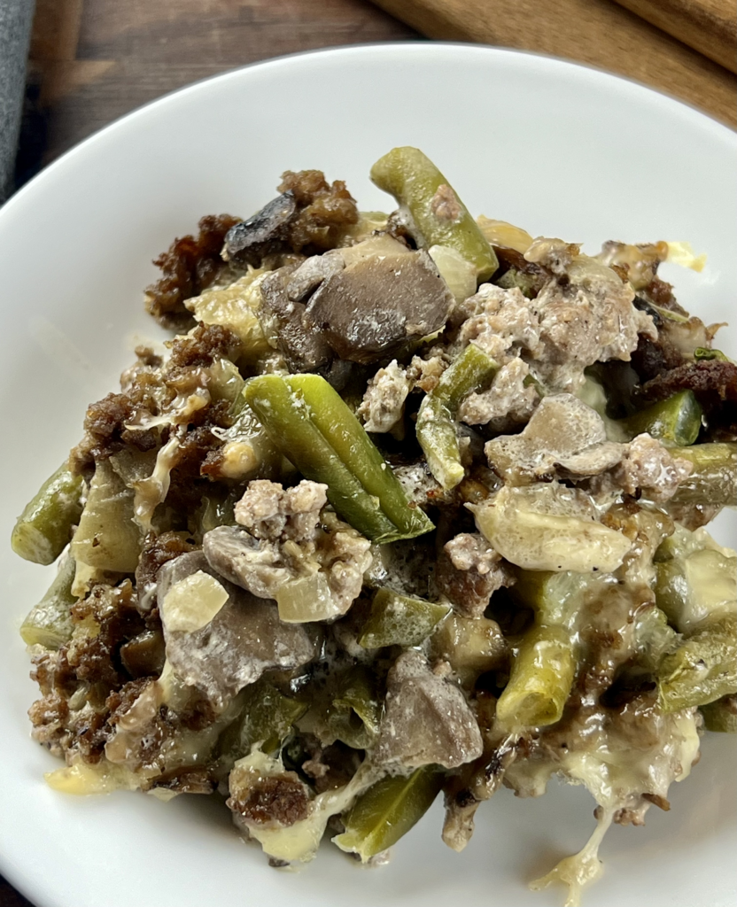 Serving of keto beef and green bean casserole with ground beef and green beans