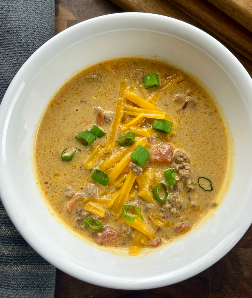 Creamy keto taco soup served over Spanish cauliflower rice